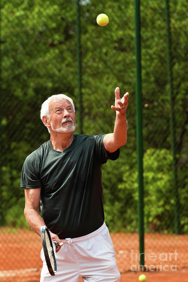 Active Senior Man Playing Tennis #17 Photograph by Microgen Images/science Photo Library
