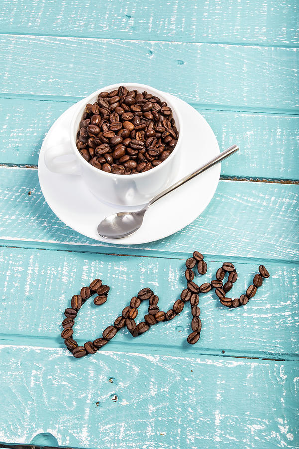 Coffee on a blue weathered table by Ben Gingell Coffee on a blue weathered table by Ben Gingell