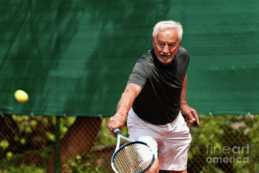 Active Senior Man Playing Tennis #18 Photograph by Microgen Images/science Photo Library