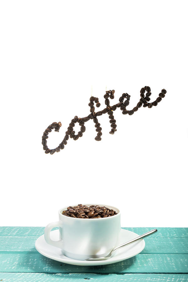 Coffee on a blue weathered table by Ben Gingell Coffee on a blue weathered table by Ben Gingell