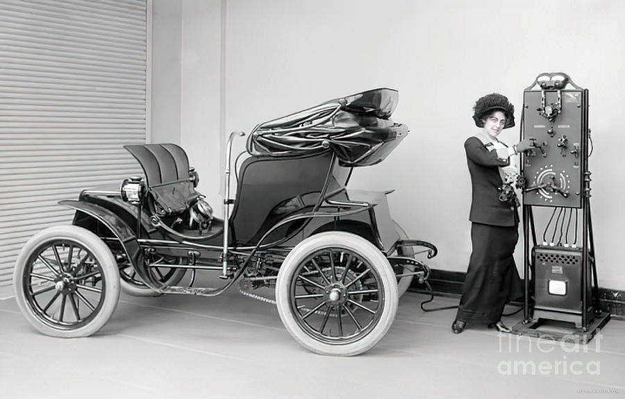 1910s Woman With Horseless Carriage And Charging Station Photograph by Retrographs