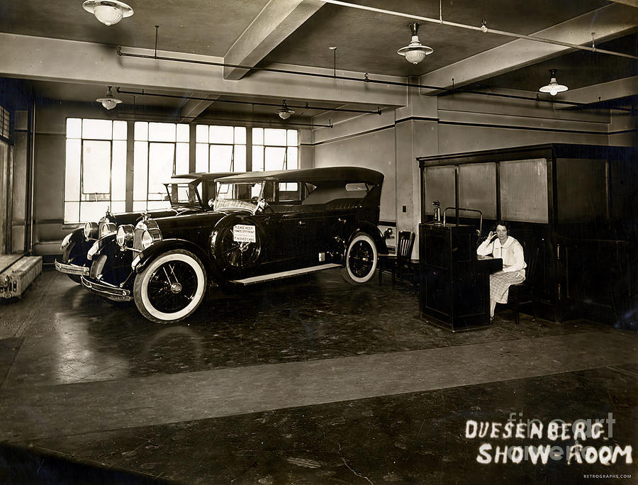 1924 Duesenberg Showroom Featuring Model A Touring Car And Sedan Photograph by Retrographs