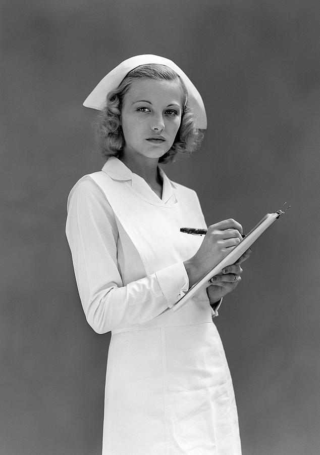 1930s 1940s Serious Blond Woman Nurse Photograph by Vintage Images - Pixels