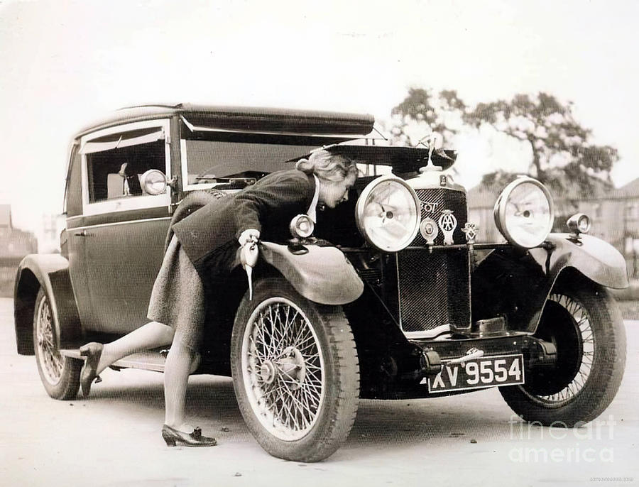 1930s British Car With Woman Inspecting Engine Photograph by Retrographs
