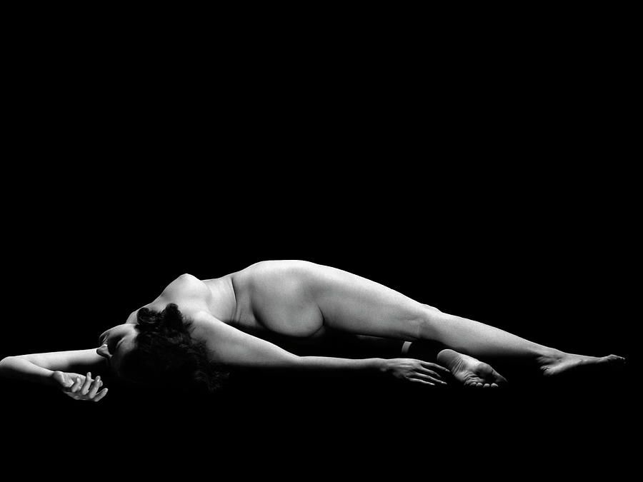 Black And White Photograph - 1930s Nude Woman Lying by Vintage Images