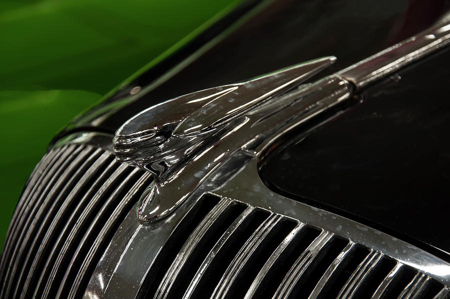 1936 Oldsmobile Hood Ornament Photograph by Flees Photos