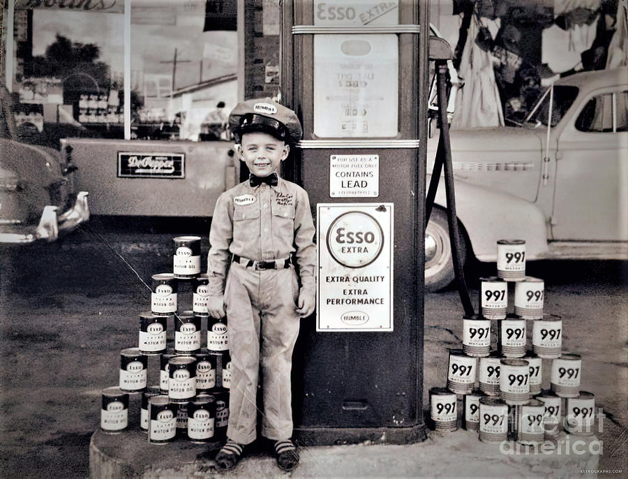1940s Esso Gas Station With Child In Uniform Photograph by Retrographs