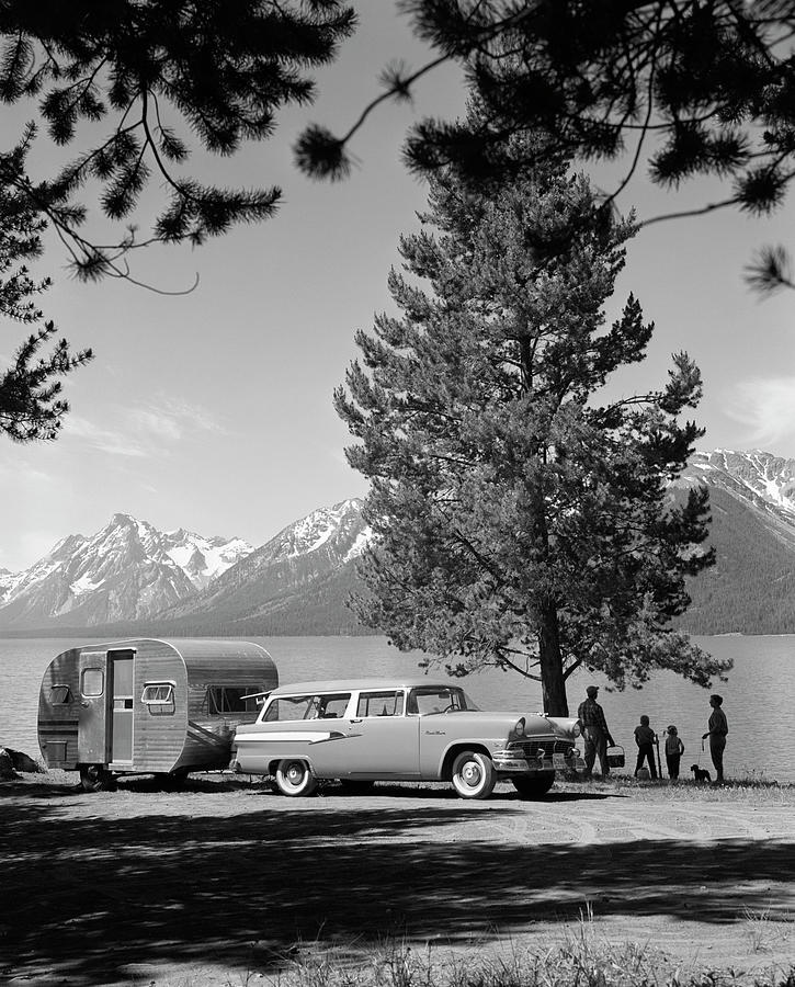 Black And White Photograph - 1950s Family Station Wagon & Trailer by Vintage Images