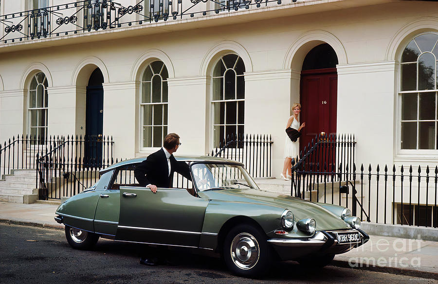 1960s London Street Scene With Citroen And Fashion Couple Photograph by Retrographs