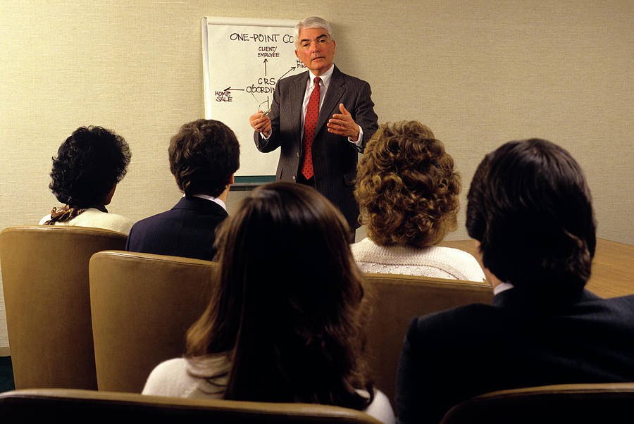 Vintage Photograph - 1980s Executive Speaking To Employees by Vintage Images