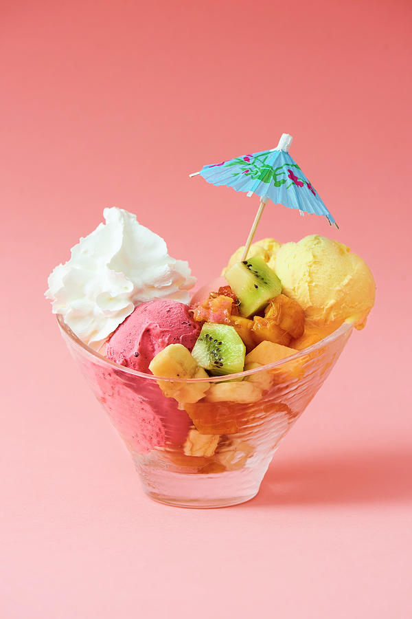 1980s Fruit Ice Cream Cup With Strawberry And Mango Ice Cream And Whipped Cream Photograph by Miha Lorencak