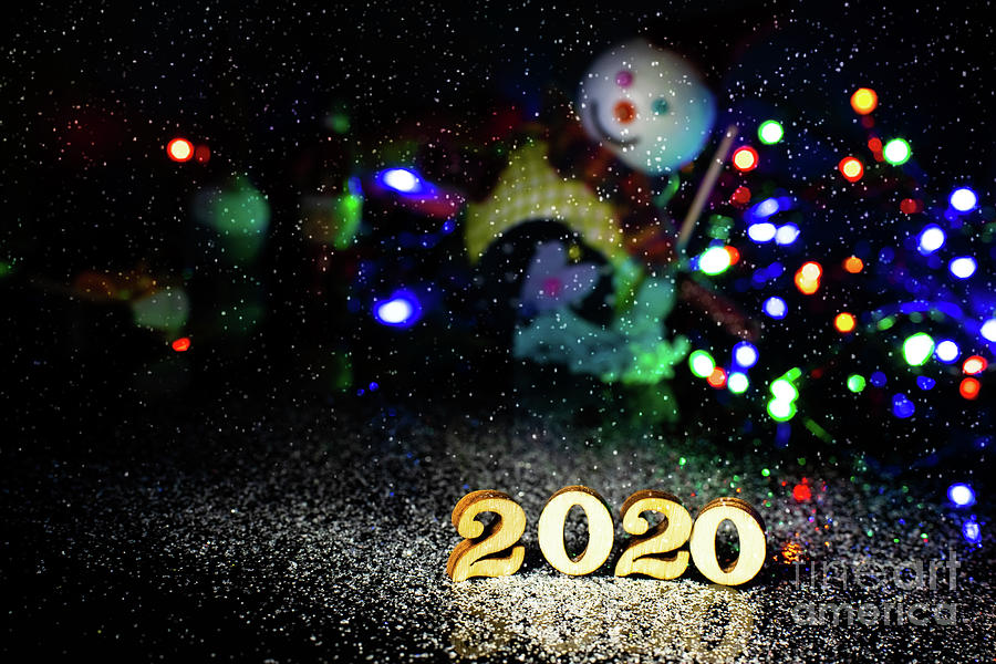 2020 happy new year wood number Christmas decoration and snow with bright background and copy space Photograph by Joaquin Corbalan