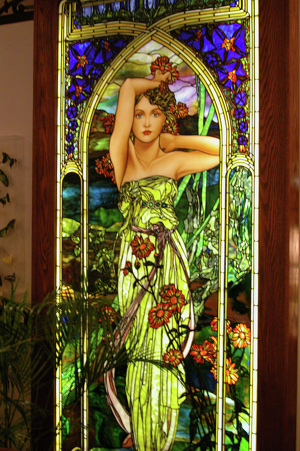 A Beautiful Woman Is Depicted In A Stained-glass Window Photograph