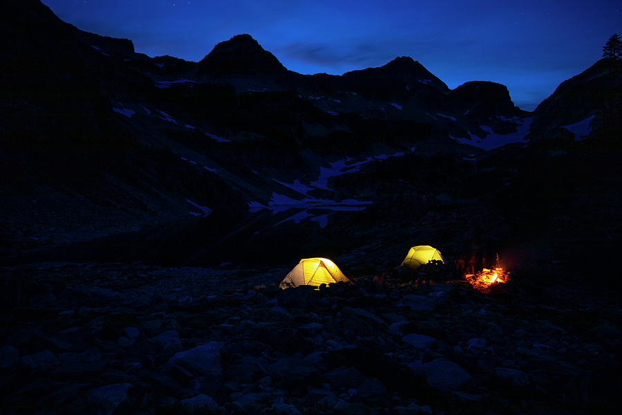 Mountain Photograph - A Campsite Glows On A Summer Night In The Mountains. #2 by Cavan Images