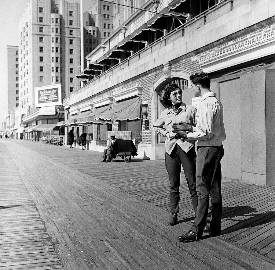 A Couple On The Boardwalk #2 Photograph by Rae Russel