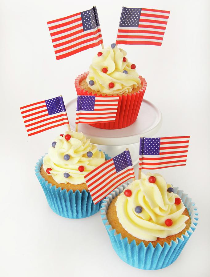 A Cupcake Decorated With Us Flags #2 Photograph by Foodfolio