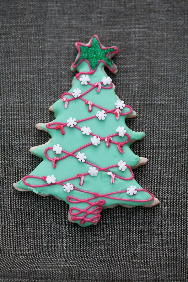 A Decorated Biscuit In The Shape Of A Christmas Tree #2 Photograph by Food Experts Group
