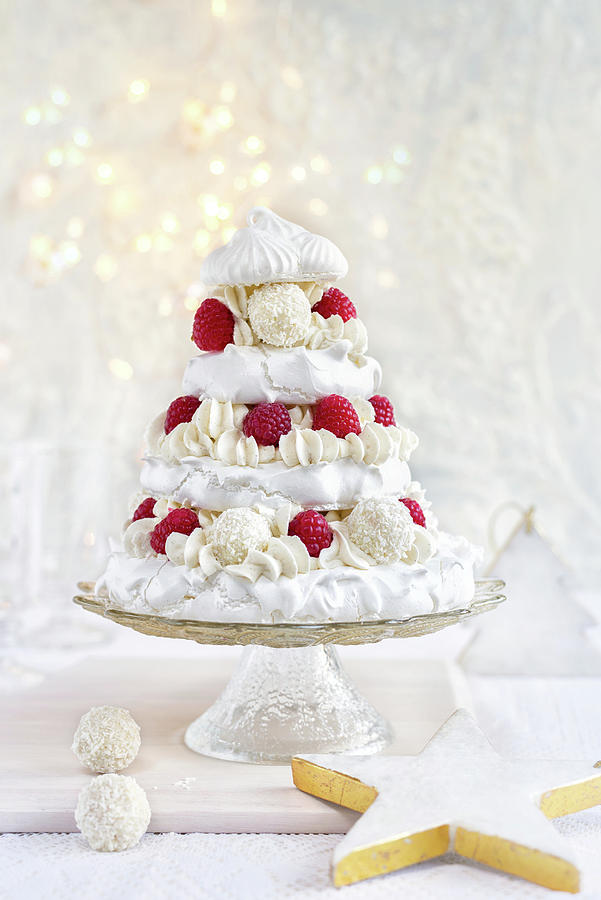 A Pavlova With Coconut Pralines And Raspberries For Christmas #2 Photograph by Lucy Parissi