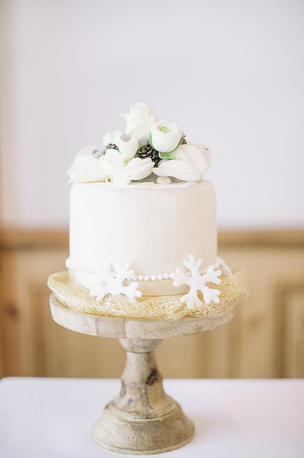 A Wedding Cake On A Restaurant Table #2 Photograph by Clara Tuma