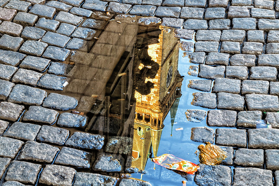 Astronomical clock in Prague in puddle Photograph by Vivida Photo PC