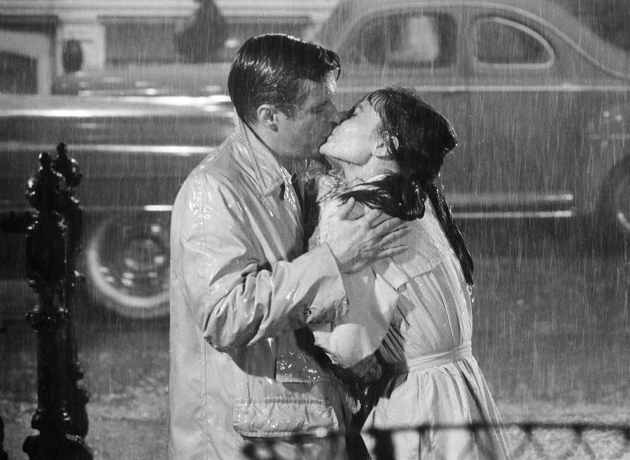 AUDREY HEPBURN and GEORGE PEPPARD in BREAKFAST AT TIFFANYS -1961-. #2 Photograph by Album