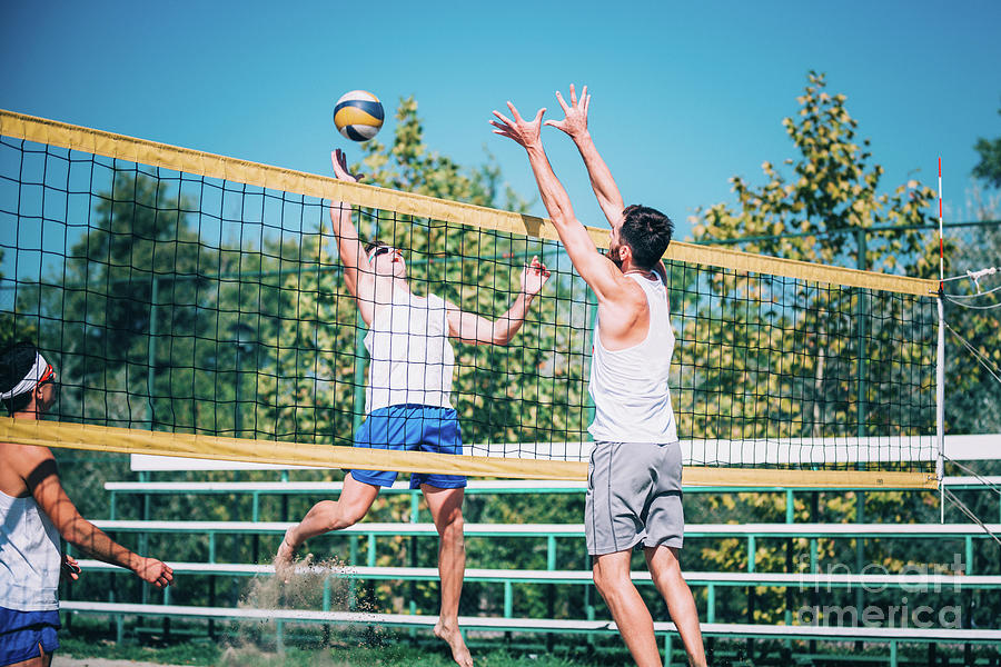 Beach Volleyball Players At The Net #2 Photograph by Microgen Images/science Photo Library