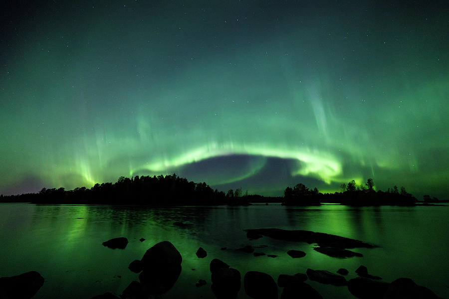 Beautiful northern lights over lake Photograph by Juhani Viitanen ...