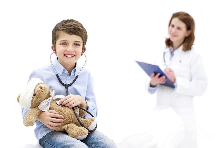 Adult Photograph - Boy Role Playing With Teddy Bear And Stethoscope #2 by Science Photo Library