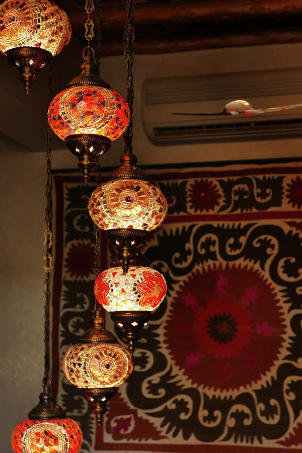 Bright glass lantern globes in a luxury hotel #2 Photograph by Steve Estvanik
