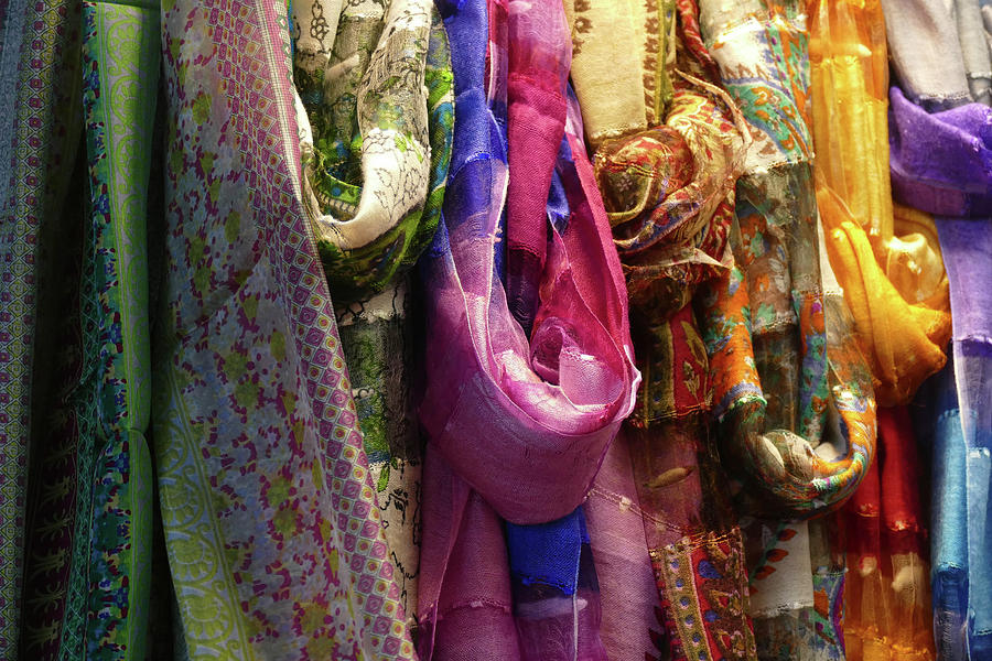 Brightly colored scarfs and veils  in the  Silk bazaar #2 Photograph by Steve Estvanik