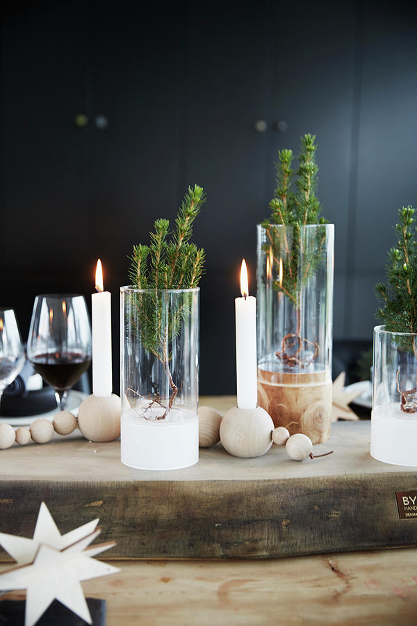 Candles, Glass And Wooden Baubles On Festively Set Wooden Table #2 Photograph by Birgitta Wolfgang Bjornvad