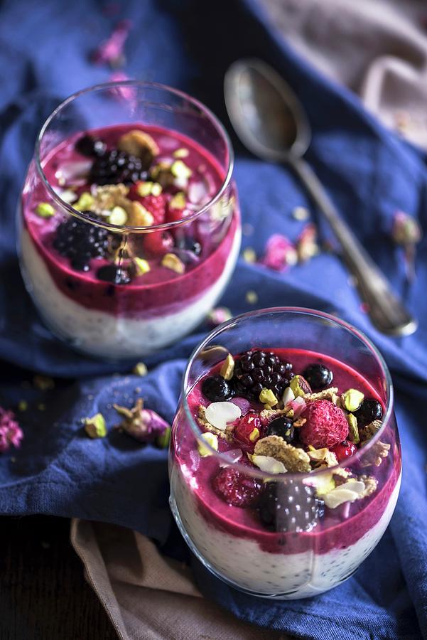 Chia Pudding Topped With Cereal And A Berry Smoothie In A Glass #2 Photograph by Ltummy