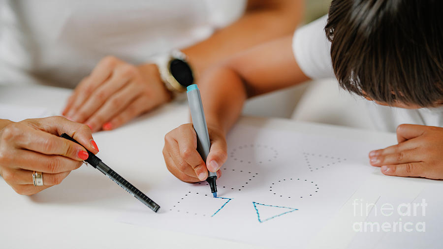 Child Colouring Shapes During Assessment #2 Photograph by Microgen Images/science Photo Library