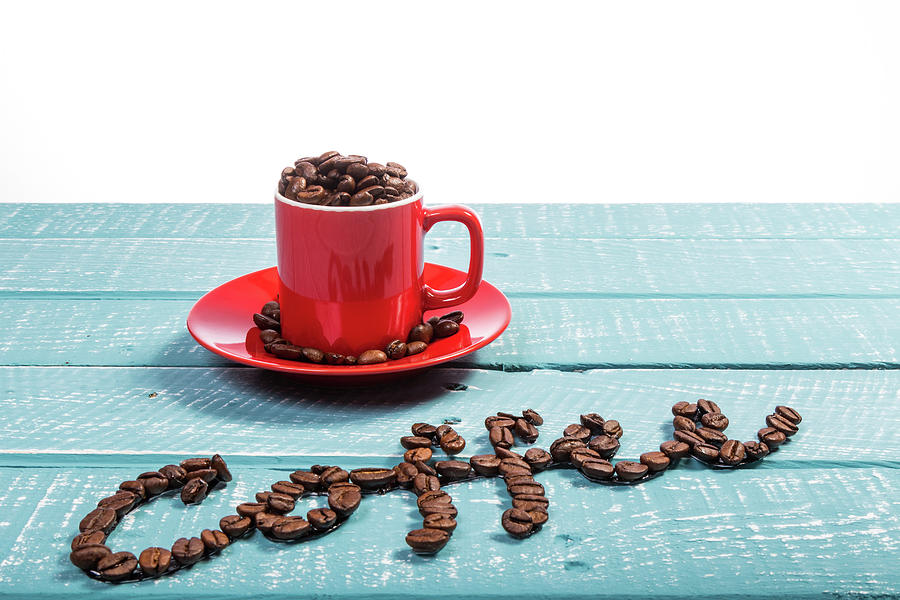 Coffee on a blue weathered table by Ben Gingell Coffee on a blue weathered table by Ben Gingell