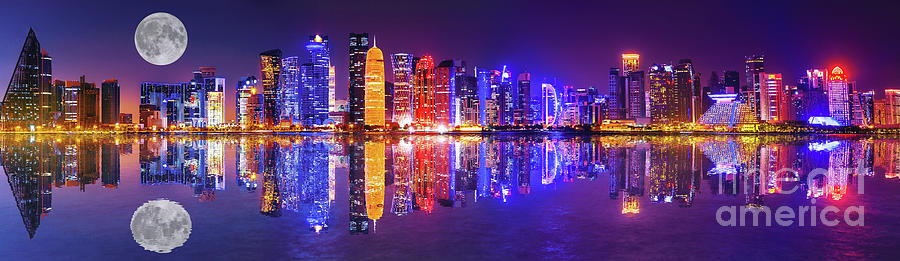 Doha skyline reflection night #2 Photograph by Benny Marty
