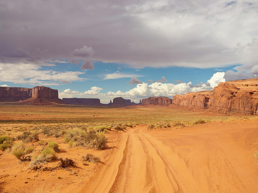 Driving Throe Monument Valley #2 Photograph by Helovi