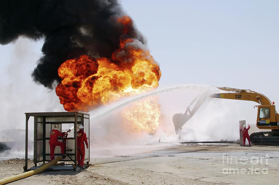 Firefighter Photograph - Fighting Iraqi Oil Well Fires #2 by Peter Menzel/science Photo Library