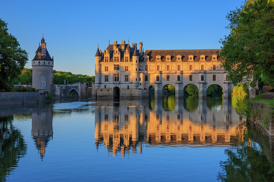 France, Centre, Loire Valley, Indre-et-loire, Cher, Chenonceaux, Chenonceau Castle, Warm Light View Of The Castle At Sunset Reflected In The River Cher #2 Digital Art by Riccardo Spila