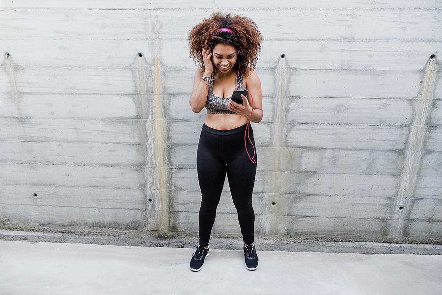 Happy Curvy African American Woman Working Out And Listening Music ...