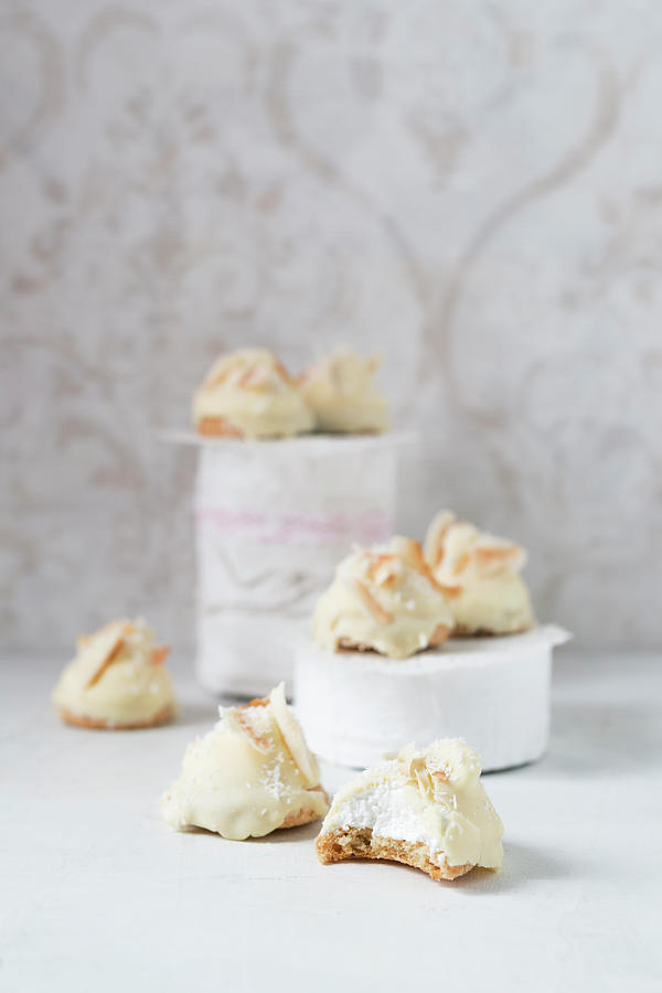 Homemade Foam Kisses With White Chocolate And Coconut Shavings On A Biscuit Base #2 Photograph by Mandy Reschke
