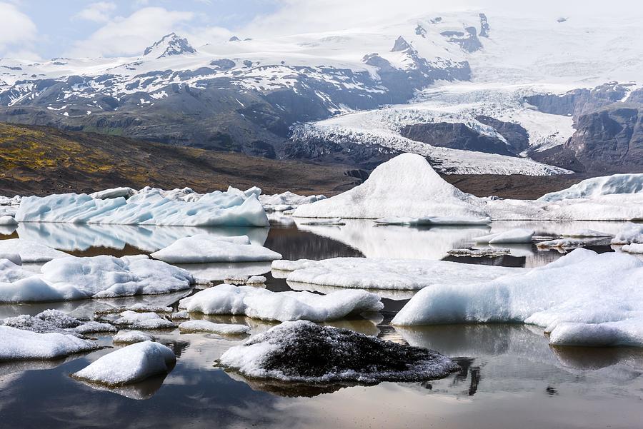Nature Photograph - Icebergs In Fjallsarlon Glacial Lagoon #2 by Ivan Kmit