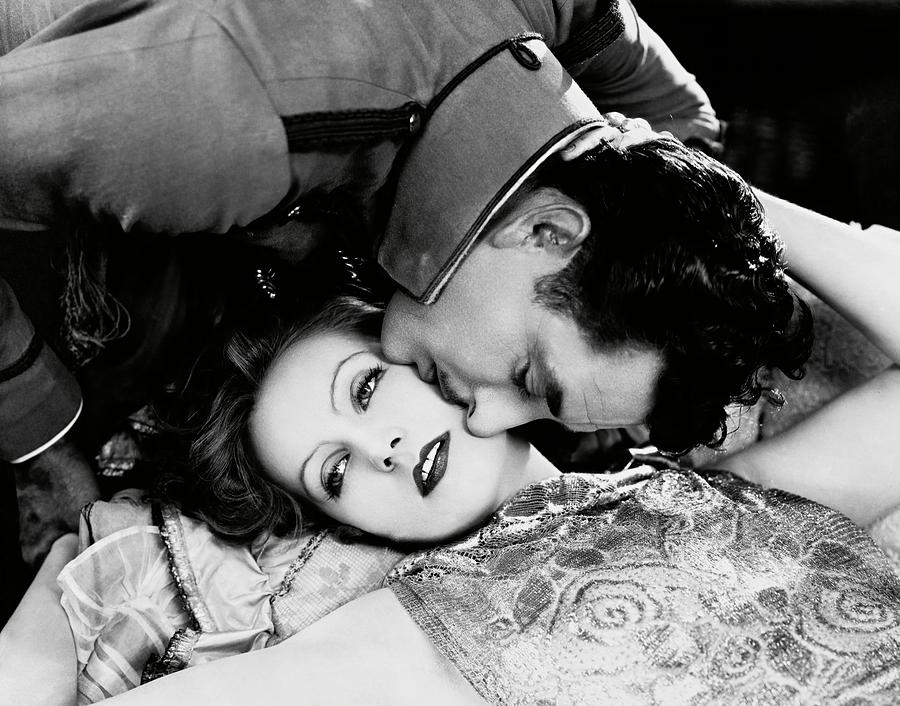 JOHN GILBERT and GRETA GARBO in THE FLESH AND THE DEVIL -1926-. #2 Photograph by Album