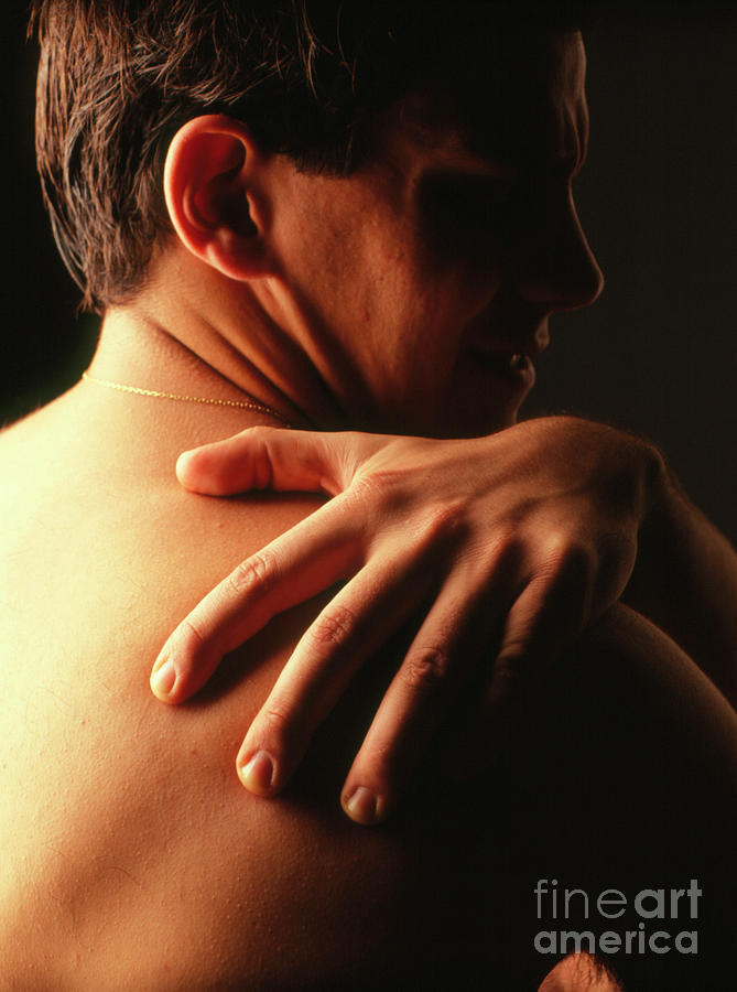 Man Holds His Shoulder Suffering From Pain #2 Photograph by Oscar Burriel/science Photo Library