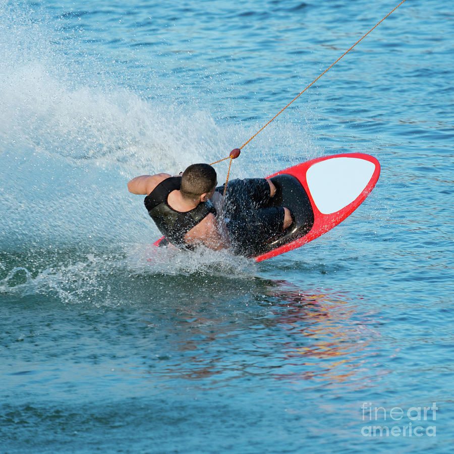 Man Kneeboarding #2 by Microgen Images/science Photo Library