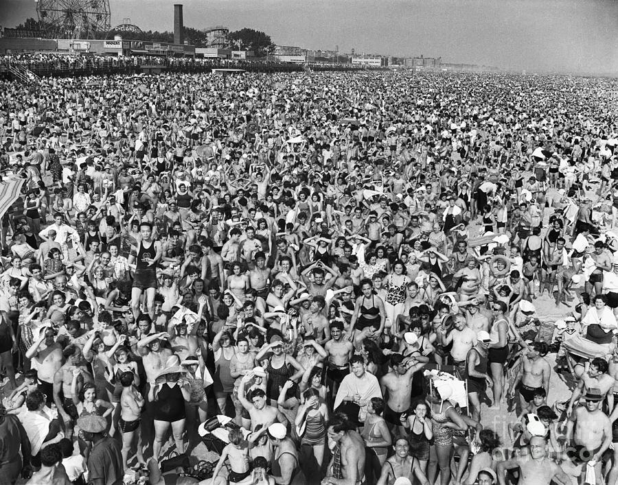 Massive Crowd On Beach At Coney Island by Bettmann