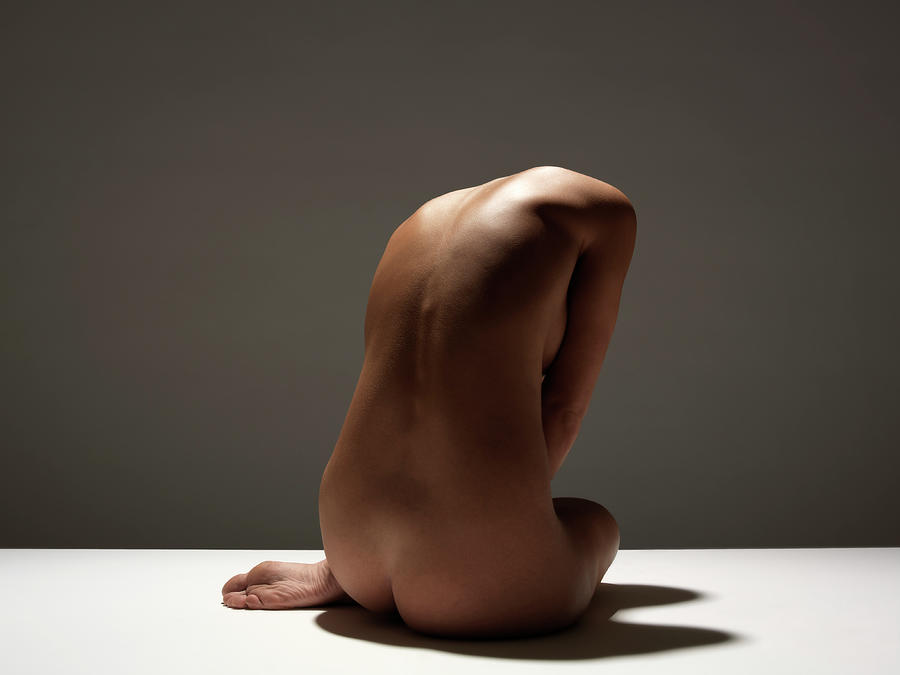 Naked Woman Sitting, Rear View Photograph by John Lamb