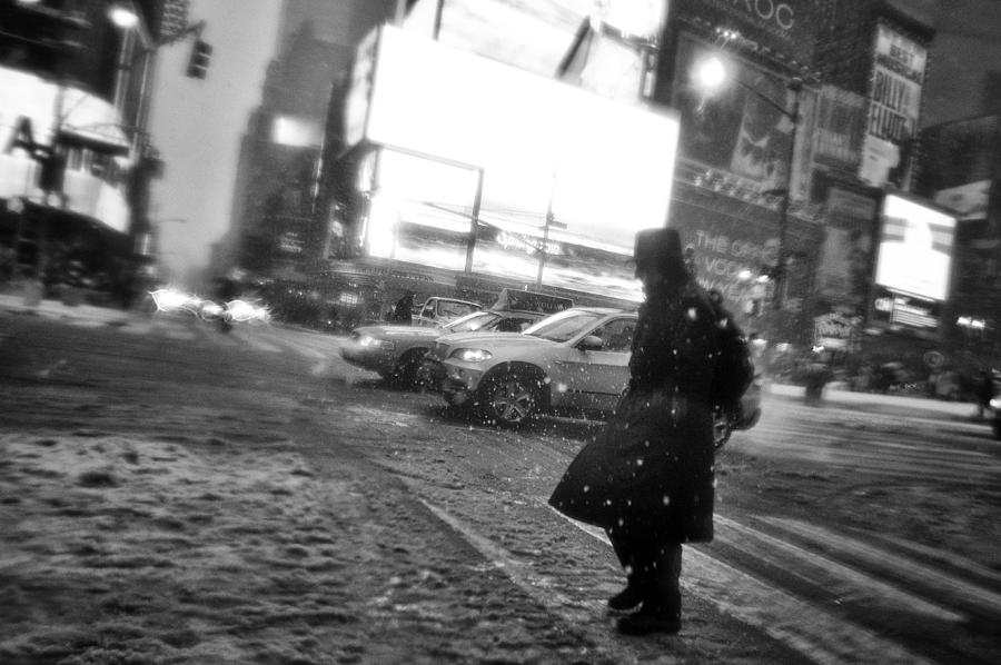 Black And White Photograph - New York Walker In Blizzard #2 by Martin Froyda