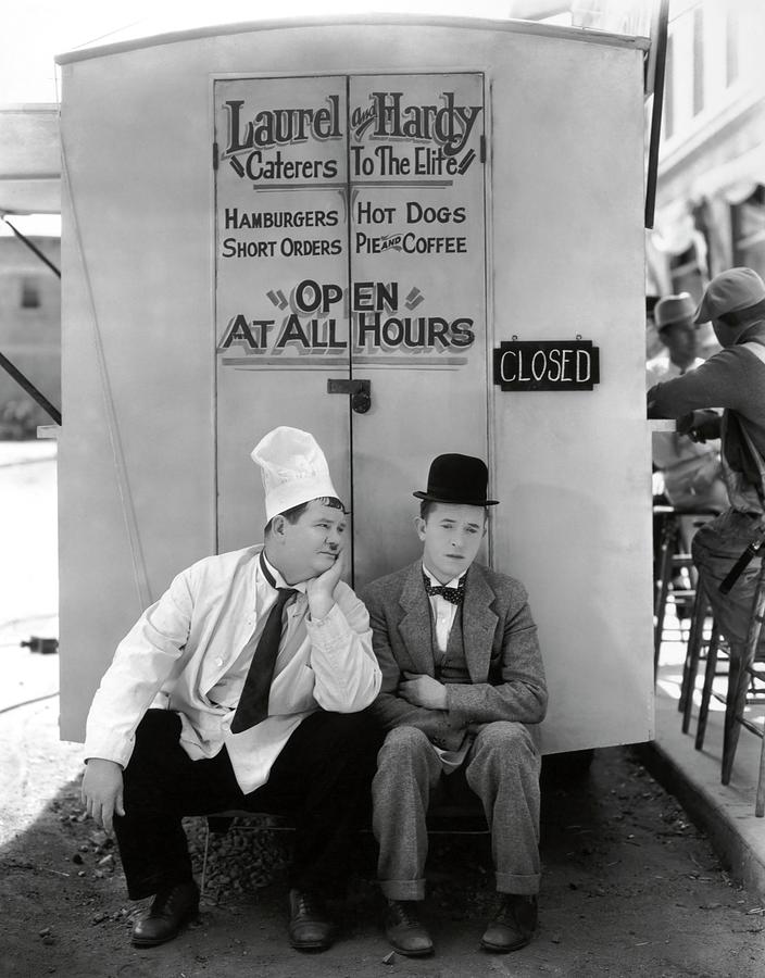 OLIVER HARDY and STAN LAUREL in PACK UP YOUR TROUBLES -1932-. #2 Photograph by Album