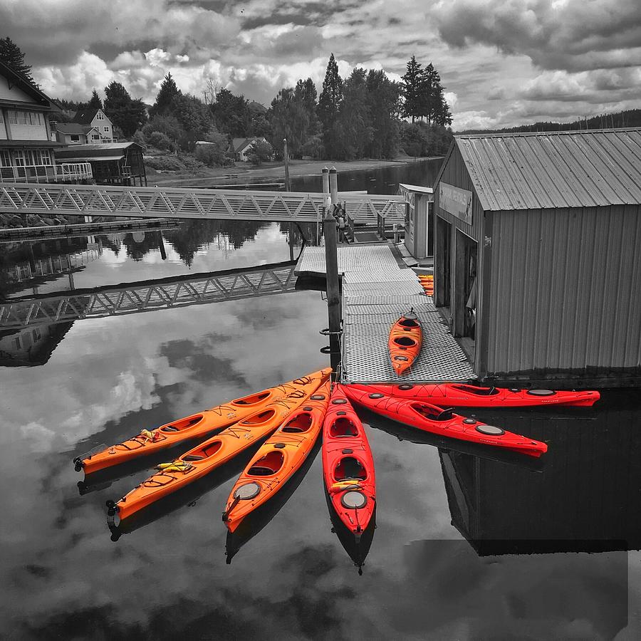 Orange Kayaks  Photograph by Jerry Abbott