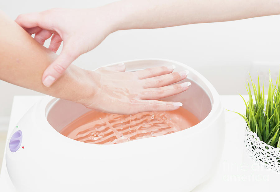 Paraffin Wax Hand Treatment Photograph by Microgen Images